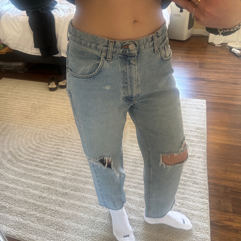 Distressed Light Blue Denim Jeans